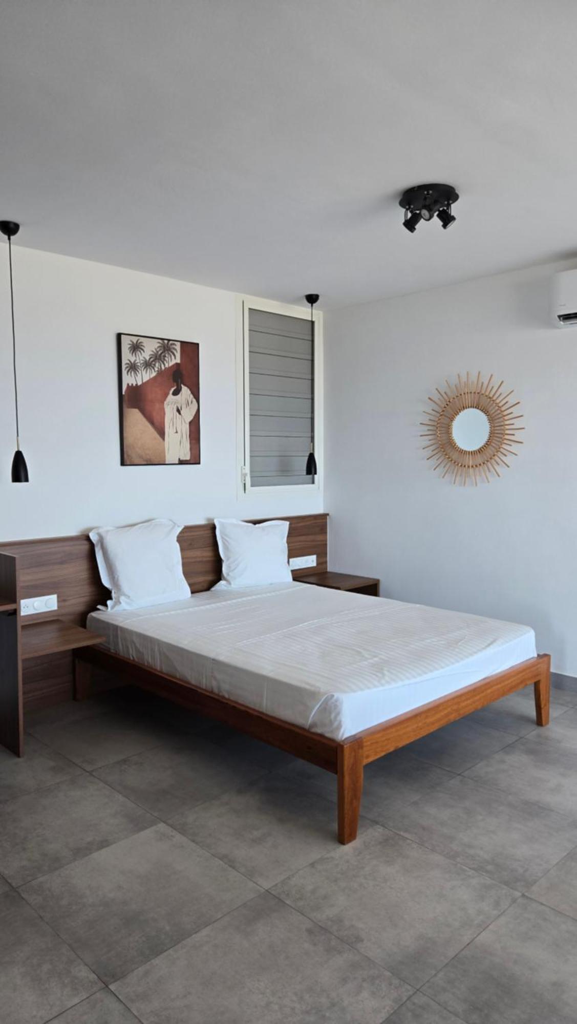 Hotel Des Roches Куру Екстериор снимка